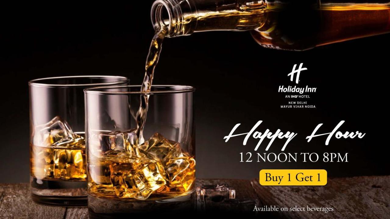 ฮอลิเดย์ อินน์ นิวเดลี มยูรวิหาร นอยดา ภายนอก รูปภาพ A poster advertising a happy hour
